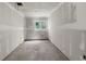 A unfinished room with drywall and flooring, offering a blank canvas for customization and personalization at 12085 Stringer Rd, Brooksville, FL 34601