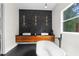 Elegant bathroom with a double vanity, modern fixtures, and a luxurious soaking tub at 12085 Stringer Rd, Brooksville, FL 34601