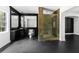 Updated bathroom with modern shower, vanity, and sleek fixtures at 12085 Stringer Rd, Brooksville, FL 34601