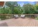 Relaxing outdoor deck area with seating, perfect for enjoying the natural surroundings at 12085 Stringer Rd, Brooksville, FL 34601