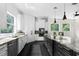 Bright kitchen featuring stainless steel appliances, ample counter space, and modern design at 12085 Stringer Rd, Brooksville, FL 34601