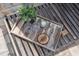 Charming outdoor tray with glasses, candle, and decorative coaster at 12085 Stringer Rd, Brooksville, FL 34601