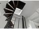 Unique spiral staircase in a modern home with a skylight above at 12085 Stringer Rd, Brooksville, FL 34601
