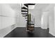 Interior shot of a modern home featuring a unique spiral staircase at 12085 Stringer Rd, Brooksville, FL 34601