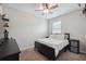 Comfortable bedroom with ceiling fan, plush carpeting and a window making it a relaxing and inviting space at 12313 Criollo Rd, Spring Hill, FL 34610