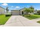 Beautiful single-story home features well-manicured landscaping and a large driveway for easy access at 12313 Criollo Rd, Spring Hill, FL 34610