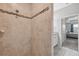 Tile shower and vanity area connect to the main bedroom in this view at 12313 Criollo Rd, Spring Hill, FL 34610