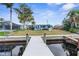 View of the backyard and canal area from the boat dock at 12535 Third Isle, Hudson, FL 34667