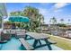 Backyard patio with seating area and views of the water and docks at 12535 Third Isle, Hudson, FL 34667