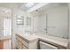 Bright bathroom features a single sink vanity and a large mirror at 128 Oak Lake Dr, Spring Hill, FL 34608