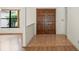 Inviting foyer with tile flooring and natural light, leading to the living areas at 128 Oak Lake Dr, Spring Hill, FL 34608