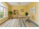 Bright office features a large window, neutral color palette, desk, chair and stylish decor, creating an inspiring workspace at 12805 Coronado Dr, Spring Hill, FL 34609