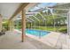 Inviting screened-in pool, perfect for relaxation and outdoor enjoyment at 12805 Coronado Dr, Spring Hill, FL 34609