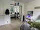 Bedroom featuring a bed, mirrored closet doors, vanity, and ocean-themed decor at 13316 Brigham Ln, Hudson, FL 34667