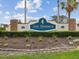 Welcoming entrance to The Reserve featuring lush landscaping and a decorative sign at 13922 Talmage Loop, Hudson, FL 34667