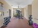 Well-equipped gym featuring weightlifting machines and free weights on a carpeted floor at 13922 Talmage Loop, Hudson, FL 34667