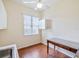 Compact office space with wood floors and natural light at 13922 Talmage Loop, Hudson, FL 34667