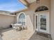 Charming brick-paved patio, perfect for outdoor dining and relaxation at 13922 Talmage Loop, Hudson, FL 34667