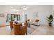 Comfortable living room featuring marble floors, recessed lighting, and an elegant entryway at 1471 N Jasmine Ave, Tarpon Springs, FL 34689