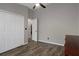 Bedroom featuring a closet, neutral paint and ceiling fan, offering a versatile space for customization at 1862 Wood Bend St, Tarpon Springs, FL 34689