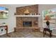 Classic brick fireplace with decorative mantle and hearth at 1862 Wood Bend St, Tarpon Springs, FL 34689