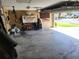 Spacious garage with ample storage and a work area at 1862 Wood Bend St, Tarpon Springs, FL 34689