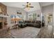 Open-concept living room with vaulted ceilings, fireplace, and natural light at 1862 Wood Bend St, Tarpon Springs, FL 34689