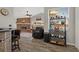 Comfortable living room featuring a cozy fireplace and attractive decor at 1862 Wood Bend St, Tarpon Springs, FL 34689