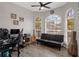 Inviting living space featuring large arched windows offering natural light and modern furniture, perfect for relaxation and entertainment at 1862 Wood Bend St, Tarpon Springs, FL 34689