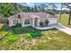 Charming home featuring manicured landscaping and a well-maintained lawn, showcasing curb appeal at 2172 Whitewood Ave, Spring Hill, FL 34609