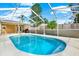 Enjoy a screened-in pool area perfect for outdoor relaxation and entertainment on sunny days at 2172 Whitewood Ave, Spring Hill, FL 34609