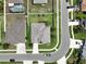 Aerial view of home on a well-manicured lot with mature landscaping and convenient street access at 22316 Red Jacket Ln, Land O Lakes, FL 34639