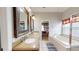 Spacious bathroom featuring double vanity, soaking tub, walk-in shower, and elegant lighting at 22316 Red Jacket Ln, Land O Lakes, FL 34639
