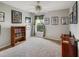 Bedroom featuring a ceiling fan, window, bookshelf, and decor at 22316 Red Jacket Ln, Land O Lakes, FL 34639