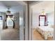 View of two bedrooms, each with ceiling fans, carpet, and natural light from windows at 22316 Red Jacket Ln, Land O Lakes, FL 34639
