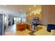 Bright kitchen flows into the living room, stainless appliances, wood cabinets, and plenty of counter space at 22316 Red Jacket Ln, Land O Lakes, FL 34639