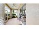 Enjoy the outdoor screened patio with ceiling fan, privacy, and access to the home interior at 22316 Red Jacket Ln, Land O Lakes, FL 34639