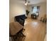 Bedroom featuring a futon, ceiling fan, and natural light from the window at 2270 Alden Ln # A, Palm Harbor, FL 34683