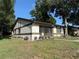 Charming exterior view of well-maintained home with lovely landscaping at 2270 Alden Ln # A, Palm Harbor, FL 34683