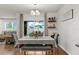The dining room has a view to the backyard through sliding glass doors at 2572 Garden Plum Pl, Odessa, FL 33556
