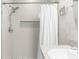 Contemporary shower with mosaic tile accents, rainfall showerhead, and built-in niche at 2572 Garden Plum Pl, Odessa, FL 33556
