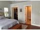 Bedroom with view to closet and bath at 2880 Chelsea N Pl, Clearwater, FL 33759