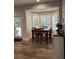 Charming breakfast nook with bay windows providing natural light and a cozy dining space at 2880 Chelsea N Pl, Clearwater, FL 33759