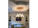 Elegant dining room with a chandelier and seating for four at 2880 Chelsea N Pl, Clearwater, FL 33759