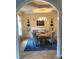 Elegant dining room with a chandelier and a round table for gatherings at 2880 Chelsea N Pl, Clearwater, FL 33759