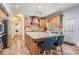 Gourmet kitchen featuring a large island with seating and stainless steel appliances at 2880 Chelsea N Pl, Clearwater, FL 33759