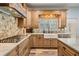 Kitchen featuring a gas cooktop, and a beautiful countertop with cabinetry at 2880 Chelsea N Pl, Clearwater, FL 33759