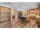 Open kitchen with central island, wooden cabinets and stainless steel appliances at 2880 Chelsea N Pl, Clearwater, FL 33759
