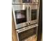 Stainless steel double wall oven featuring digital controls and sleek design at 2880 Chelsea N Pl, Clearwater, FL 33759