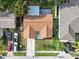 Aerial view of a home showcasing its layout, surrounding landscaping and neighborhood at 2887 Cathy Ln, Clearwater, FL 33760